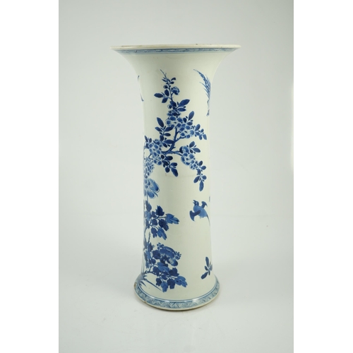 148 - A tall Chinese blue and white pheasants and rocks beaker vase, gu, Kangxi period, painted with phe... 