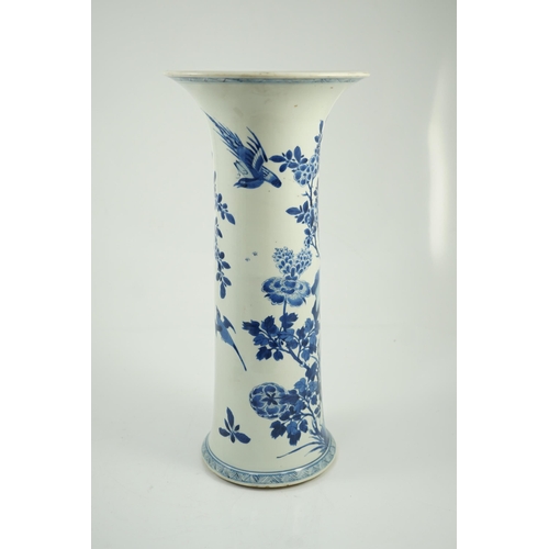 148 - A tall Chinese blue and white pheasants and rocks beaker vase, gu, Kangxi period, painted with phe... 