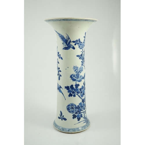 148 - A tall Chinese blue and white pheasants and rocks beaker vase, gu, Kangxi period, painted with phe... 