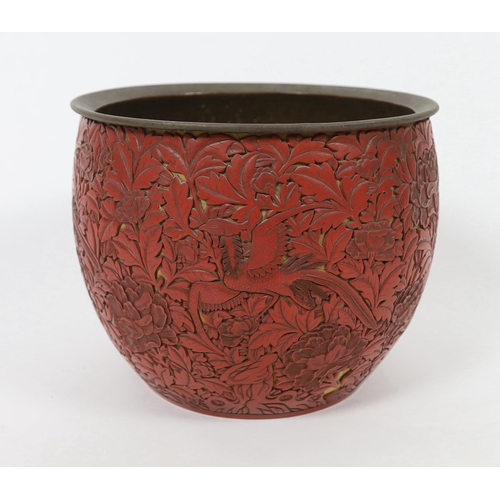 150 - A large Chinese cinnabar lacquer pheasant and peony jardiniere, 19th century, elaborately carved i... 