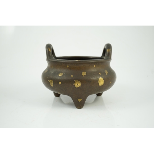 158 - A large Chinese gold-splashed bronze tripod censer, ding, Kangxi period, the gold-splashed decoratio... 