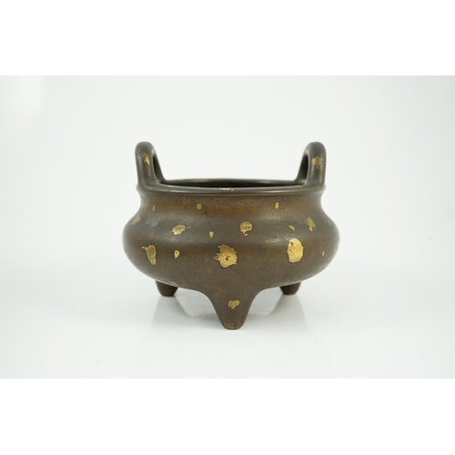 158 - A large Chinese gold-splashed bronze tripod censer, ding, Kangxi period, the gold-splashed decoratio... 