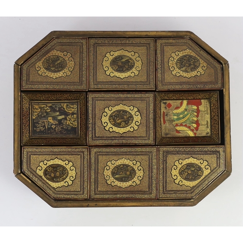 168 - A Chinese gilt decorated black lacquer games box, mid 19th century, the cover decorated with figures... 