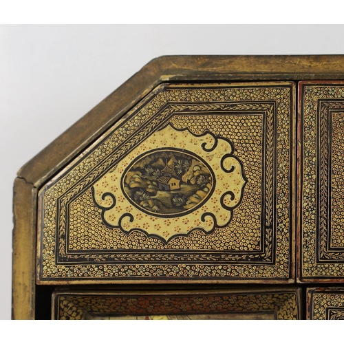 168 - A Chinese gilt decorated black lacquer games box, mid 19th century, the cover decorated with figures... 