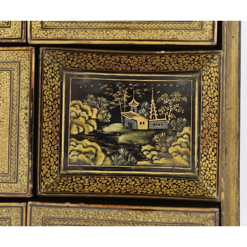 168 - A Chinese gilt decorated black lacquer games box, mid 19th century, the cover decorated with figures... 