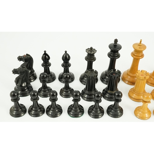 17 - An early Jaques Staunton pattern lead weighted boxwood and ebony chess set, c.1850, white king stamp... 