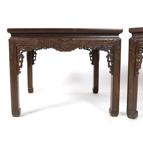 172 - A pair of Chinese huali corner-leg low tables, Qing dynasty, the square three board panelled top wit... 