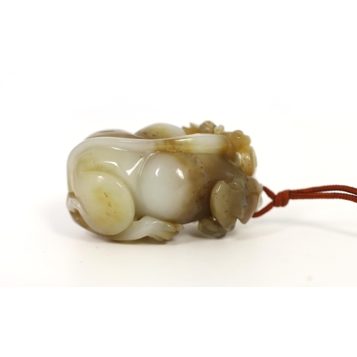 175 - A Chinese white and brown jade lion-dog carving, carved in the round with openwork head and limbs, 5... 