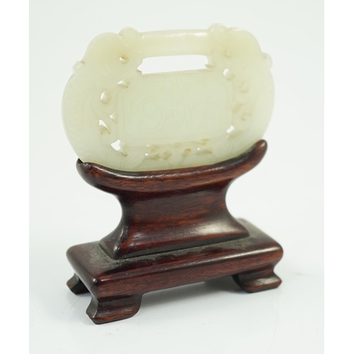 177 - A Chinese pale celadon jade lock pendant, 19th century, carved and pierced with a pair of mythical... 