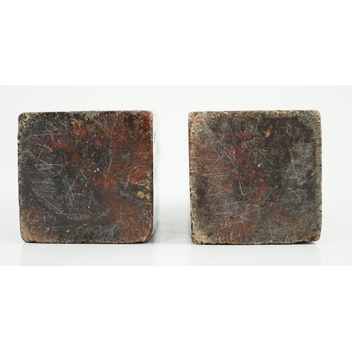 181 - A pair of Chinese soapstone lion-dog seals, Qing dynasty, with vacant matrices, the dark grey stone ... 