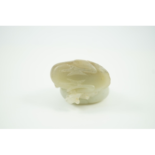 184 - A Chinese pale celadon jade chicken group, 19th century, the hen and the cockerel both grasping a sp... 