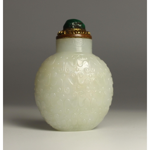 185 - A good Chinese archaistic white jade snuff bottle, 1780-1850, of flattened flask form, well hollowed... 