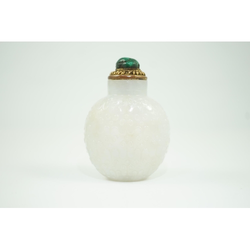 185 - A good Chinese archaistic white jade snuff bottle, 1780-1850, of flattened flask form, well hollowed... 