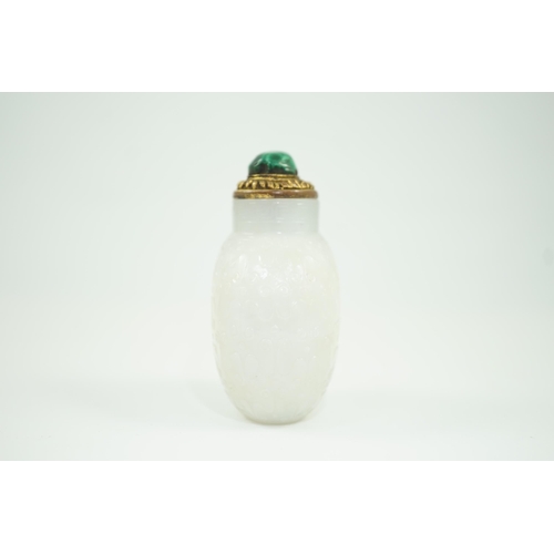 185 - A good Chinese archaistic white jade snuff bottle, 1780-1850, of flattened flask form, well hollowed... 