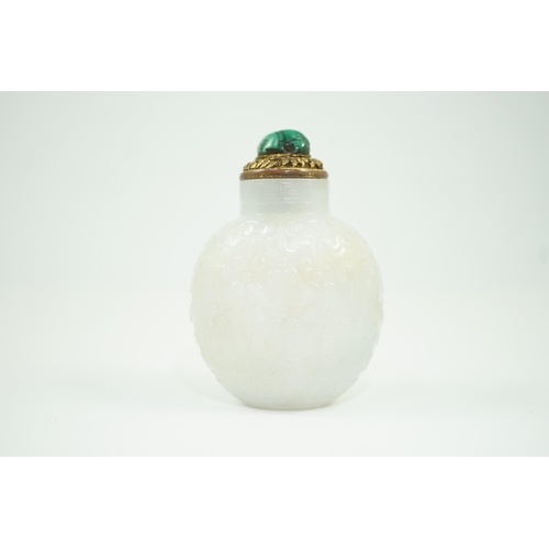 185 - A good Chinese archaistic white jade snuff bottle, 1780-1850, of flattened flask form, well hollowed... 