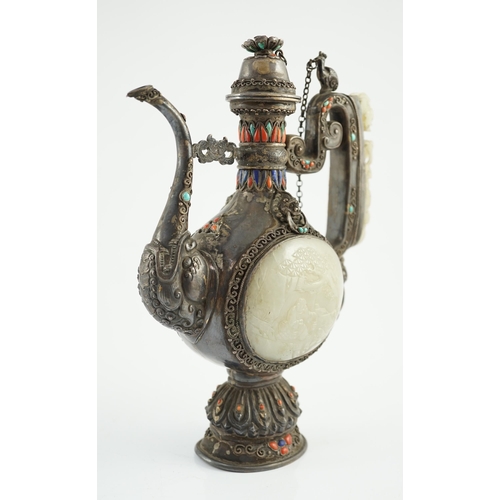 188 - A Tibetan silver, jade, coral and hardstone mounted ewer, late 19th century, the Chinese pale celado... 