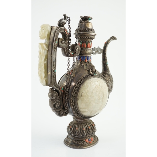 188 - A Tibetan silver, jade, coral and hardstone mounted ewer, late 19th century, the Chinese pale celado... 