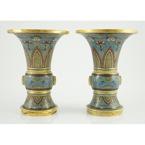 195 - A pair of Chinese cloisonné enamel beaker vases, each decorated with leaf scrolls, ruyi heads, lotus... 