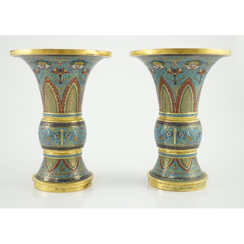 195 - A pair of Chinese cloisonné enamel beaker vases, each decorated with leaf scrolls, ruyi heads, lotus... 