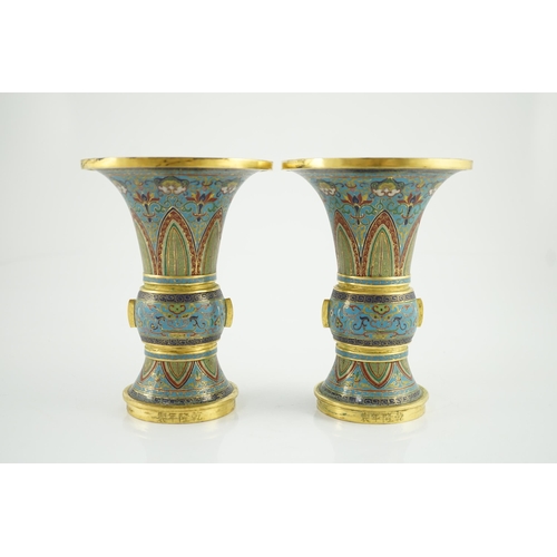 195 - A pair of Chinese cloisonné enamel beaker vases, each decorated with leaf scrolls, ruyi heads, lotus... 