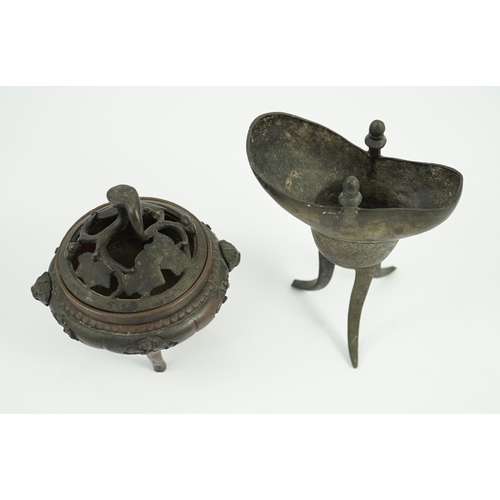 198 - A Chinese bronze and copper alloy tripod censer and cover and a Chinese archaistic bronze tripod ves... 