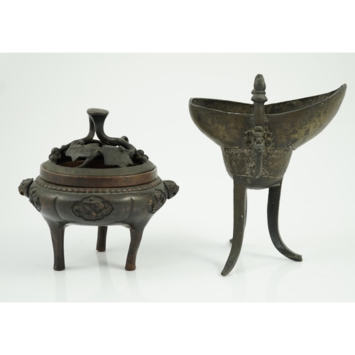 198 - A Chinese bronze and copper alloy tripod censer and cover and a Chinese archaistic bronze tripod ves... 