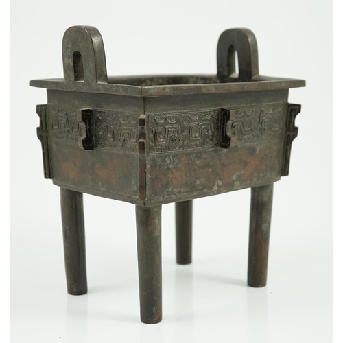 199 - A Chinese archaistic bronze vessel, fangding, 17th/18th century, cast and chased with a band of zoom... 