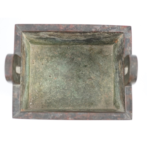 199 - A Chinese archaistic bronze vessel, fangding, 17th/18th century, cast and chased with a band of zoom... 