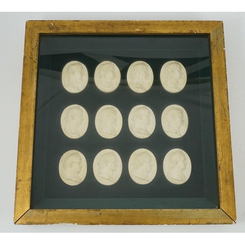 20 - Three framed sets of simulated plaster classical gems, all depicting named Roman Emperors, largest o... 