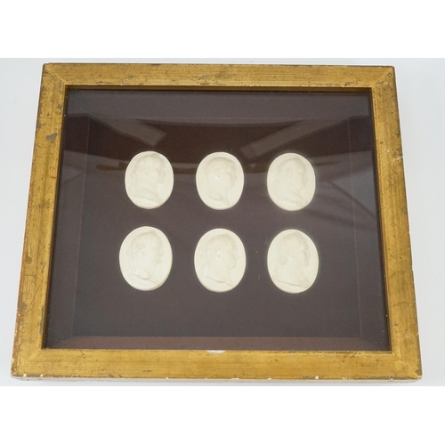 20 - Three framed sets of simulated plaster classical gems, all depicting named Roman Emperors, largest o... 