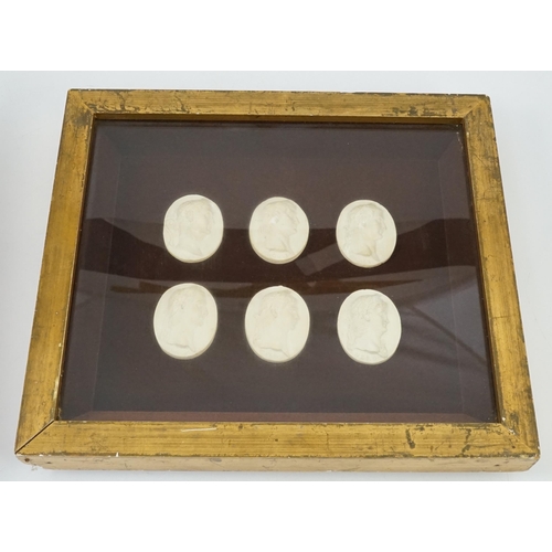 20 - Three framed sets of simulated plaster classical gems, all depicting named Roman Emperors, largest o... 