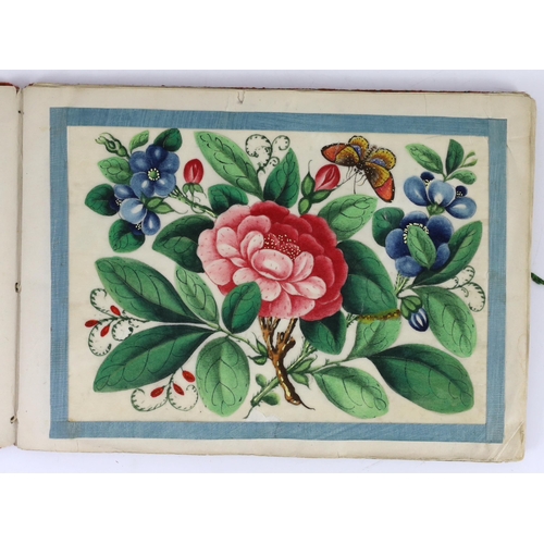 207 - A Chinese album of twelve pith paintings of flowers and insects, 19th century, each page with a blue... 