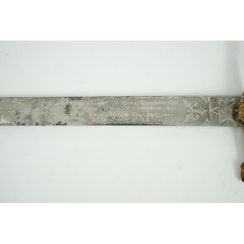 21 - An early 20th century Royal Presentation midshipman's dirk, with blade inscribed 'Presented by HM Ki... 