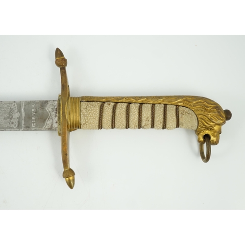 21 - An early 20th century Royal Presentation midshipman's dirk, with blade inscribed 'Presented by HM Ki... 