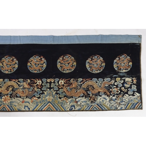 211 - A Chinese embroidered silk 'dragon' table frontal, 19th century, woven in coloured silks and metal t... 