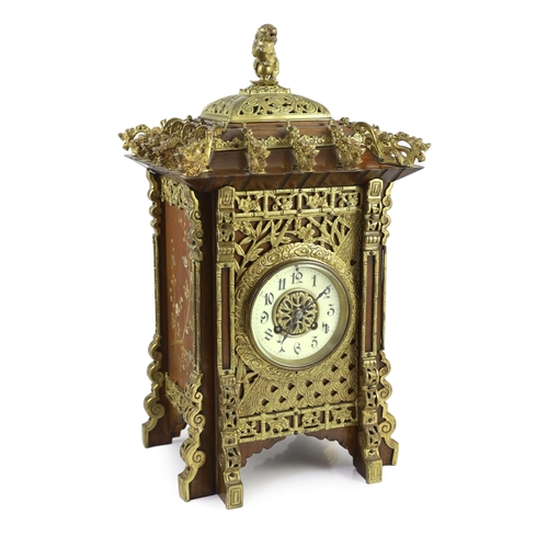 219 - A late 19th century French ormolu mounted mahogany and shibayama style mantel clock, in the Japanese... 