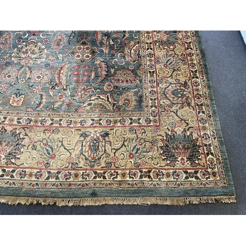 225 - An Indian Persian style sage green ground carpet, 465 x 363cm