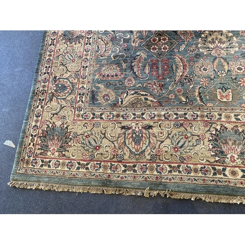 225 - An Indian Persian style sage green ground carpet, 465 x 363cm