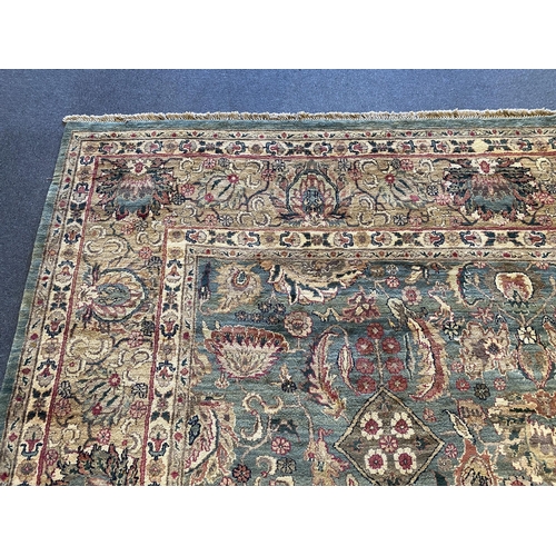 225 - An Indian Persian style sage green ground carpet, 465 x 363cm