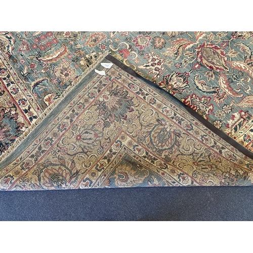 225 - An Indian Persian style sage green ground carpet, 465 x 363cm