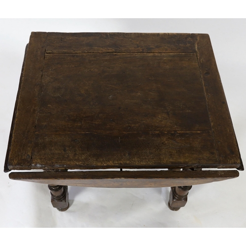 229 - A late 17th century Spanish walnut dining table, the rectangular top with four demi-lune flaps on tu... 