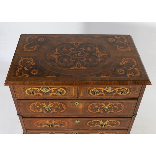 234 - A William III and later walnut and marquetry chest on stand, with quartered top centred with an oval... 