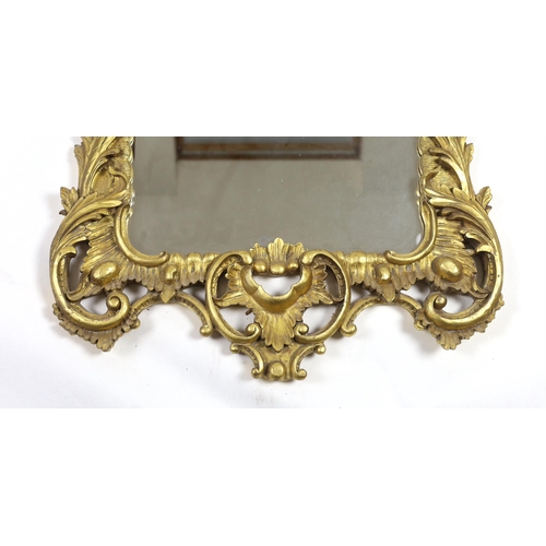 238 - A 19th century Chippendale style carved giltwood wall mirror, with foliate scroll frame and rectangu... 