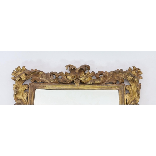 240 - A late 17th/early 18th century Florentine carved giltwood frame, with boldly carved scrolling leaves... 