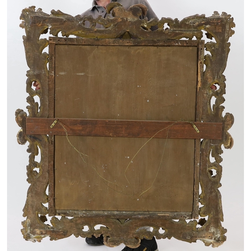 240 - A late 17th/early 18th century Florentine carved giltwood frame, with boldly carved scrolling leaves... 