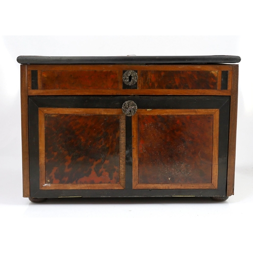 242 - An early 18th century Indo Portuguese ebony, satinwood and red tortoiseshell travelling case, the hi... 