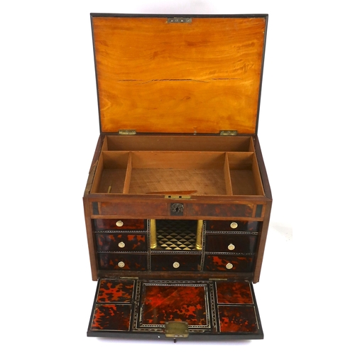 242 - An early 18th century Indo Portuguese ebony, satinwood and red tortoiseshell travelling case, the hi... 