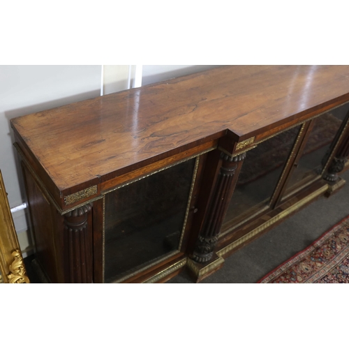 243 - A George IV ormolu mounted rosewood breakfront dwarf bookcase, with rectangular foliate paterae to t... 