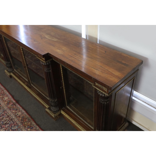 243 - A George IV ormolu mounted rosewood breakfront dwarf bookcase, with rectangular foliate paterae to t... 