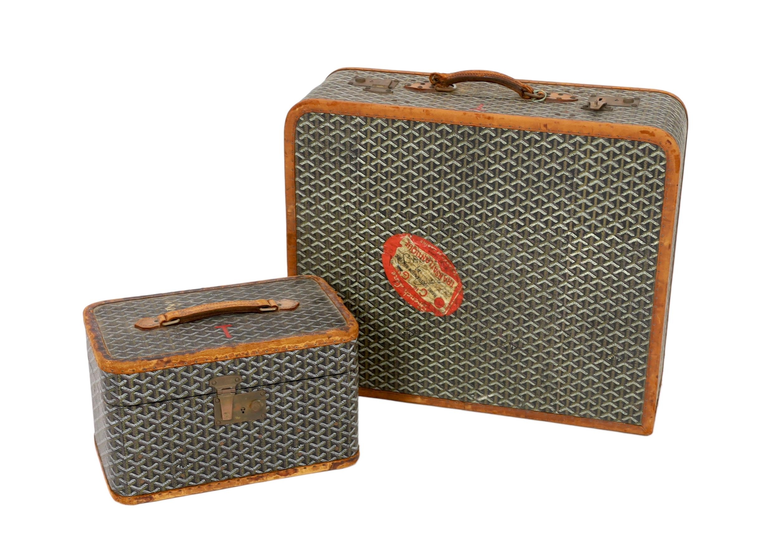 A 1940's Goyard vanity case with matching suitcase, each with tan